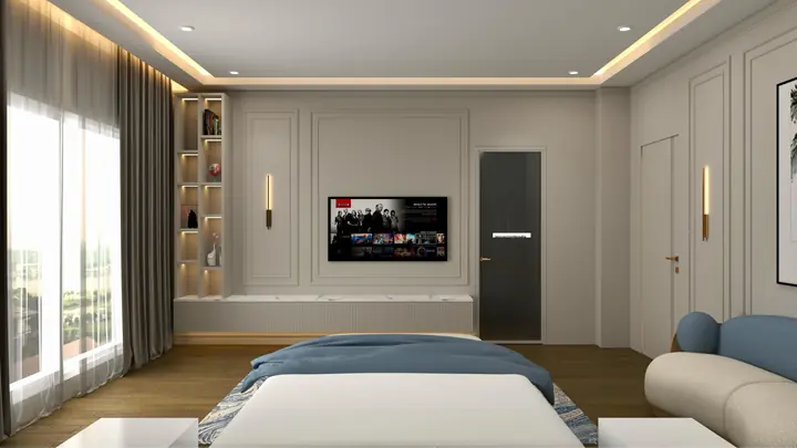 Bedroom seen towards a wall-mounted TV and storage